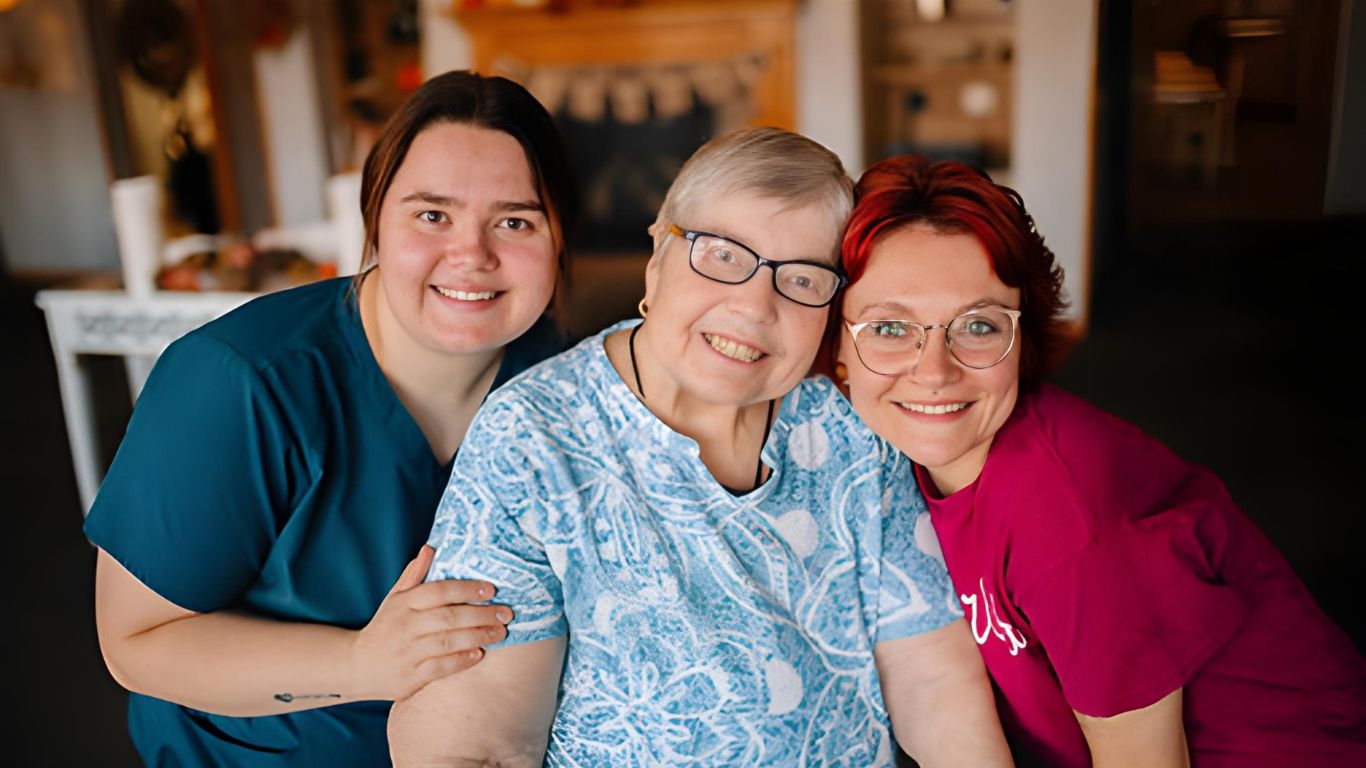 Resident and staff member at Traditions at Serenity Villa