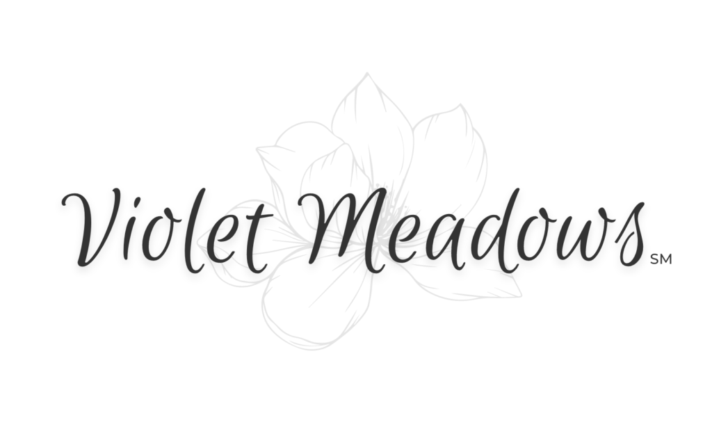 Logo of Violet Meadows featuring a creative and elegant design