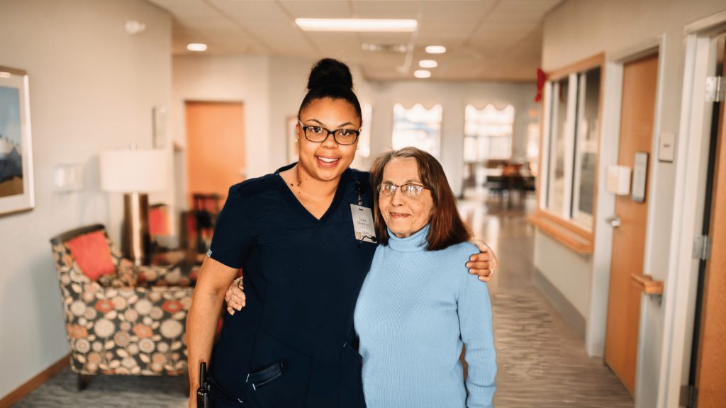 Violet Meadows caregiver with senior resident