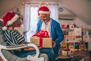 Senior receiving gift during holidays