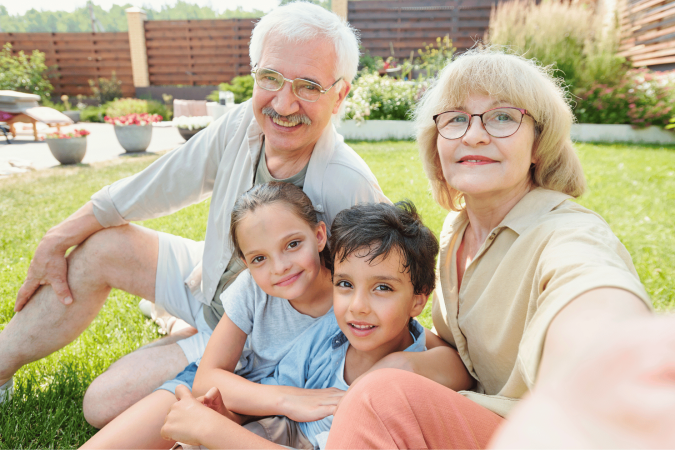 seniors and children interacting in assisted living community