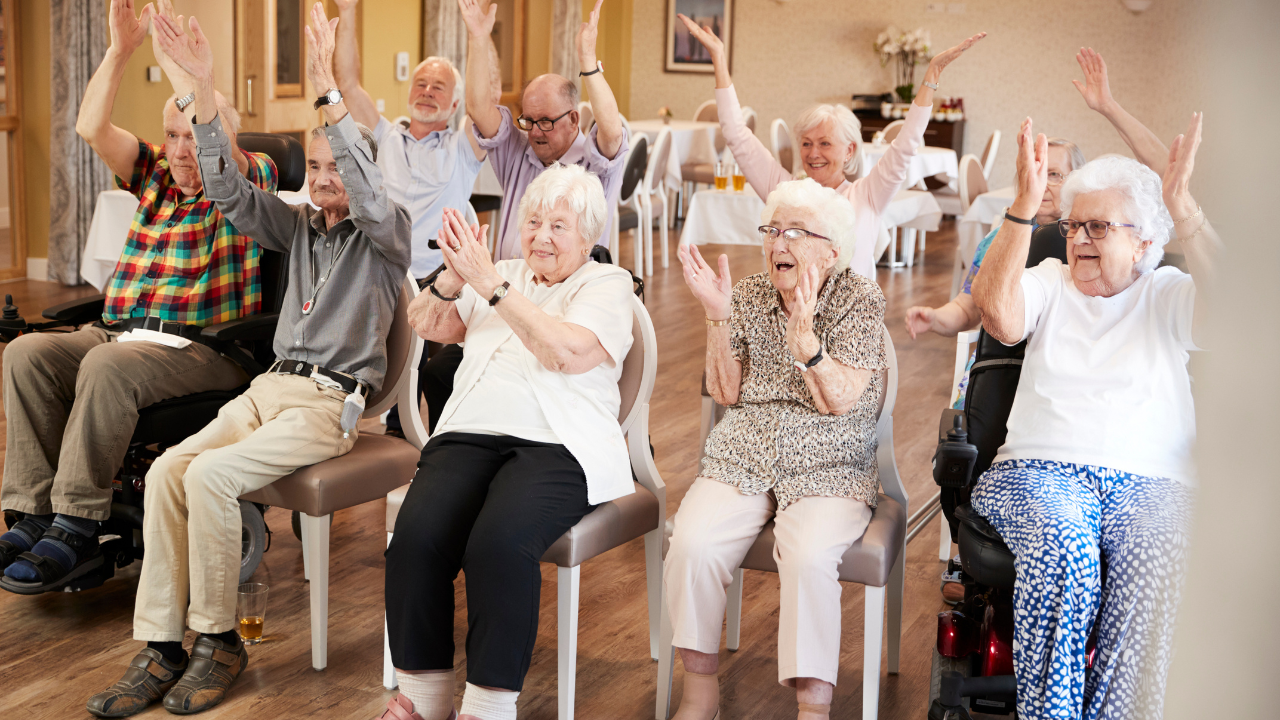 Group of Seniors Enjoying Fitness Class in Retirement Home